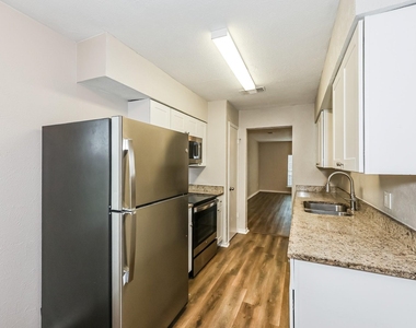 7225 Harold Walker Drive - Photo Thumbnail 2