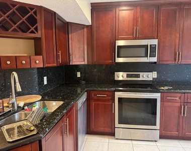8781 Wiles Road - Photo Thumbnail 6