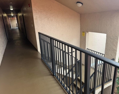 8781 Wiles Road - Photo Thumbnail 2