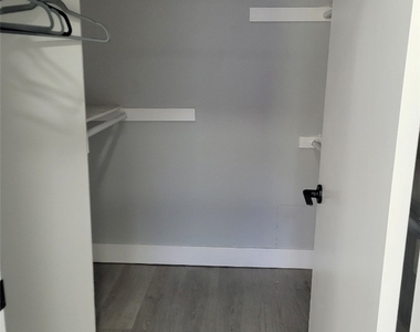 15233 Santa Gertrudes Avenue - Photo Thumbnail 7