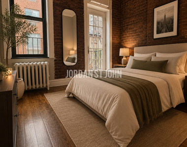 E 23RD ST - Photo Thumbnail 1