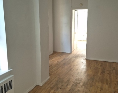 239 E 28th Street - Photo Thumbnail 2