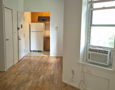 239 E 28th Street - Photo Thumbnail 4