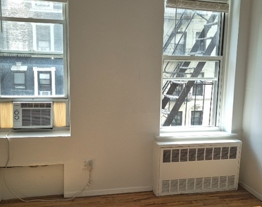 239 E 28th Street - Photo Thumbnail 6