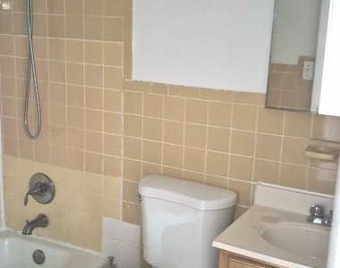 239 E 28th Street - Photo Thumbnail 7