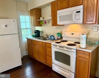 211 E Boscawen Street - Photo Thumbnail 3