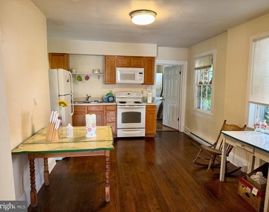 211 E Boscawen Street - Photo Thumbnail 2