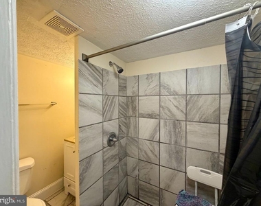 211 E Boscawen Street - Photo Thumbnail 7