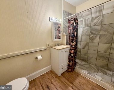 211 E Boscawen Street - Photo Thumbnail 12