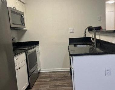 8607 Beekman Place - Photo Thumbnail 2