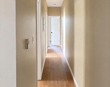 7018 Woodland Avenue - Photo Thumbnail 3