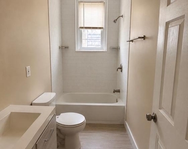 7018 Woodland Avenue - Photo Thumbnail 9
