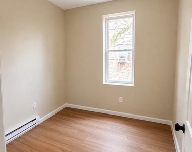 7018 Woodland Avenue - Photo Thumbnail 6