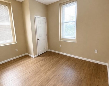 7018 Woodland Avenue - Photo Thumbnail 8