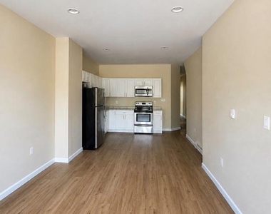 7018 Woodland Avenue - Photo Thumbnail 1