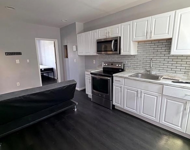 7018 Woodland Avenue - Photo Thumbnail 1