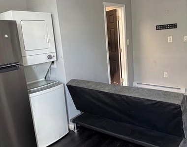 7018 Woodland Avenue - Photo Thumbnail 3