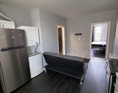 7018 Woodland Avenue - Photo Thumbnail 4