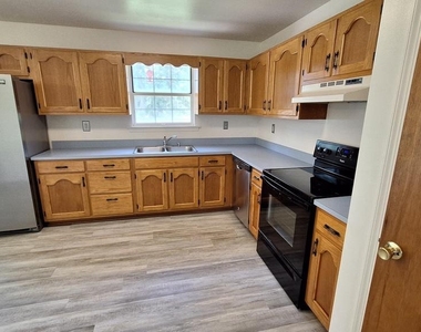 7108 Glen Albin Road - Photo Thumbnail 2