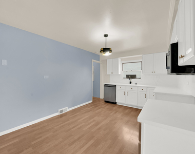 4933 S Lockwood Avenue - Photo Thumbnail 2