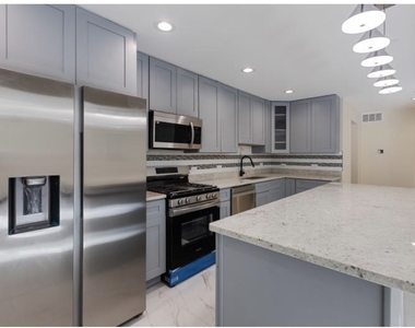 442 E 48th Street - Photo Thumbnail 3
