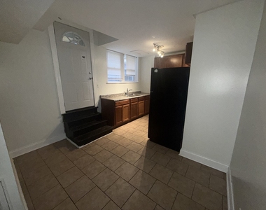 2000 W Jarvis Avenue - Photo Thumbnail 6