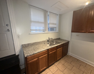 2000 W Jarvis Avenue - Photo Thumbnail 5