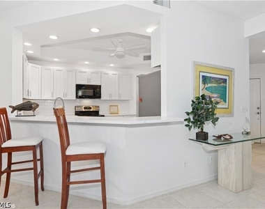 7048 Pelican Bay Boulevard - Photo Thumbnail 5