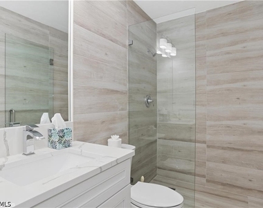 7048 Pelican Bay Boulevard - Photo Thumbnail 12