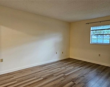 1712 Belleair Forest Drive - Photo Thumbnail 7