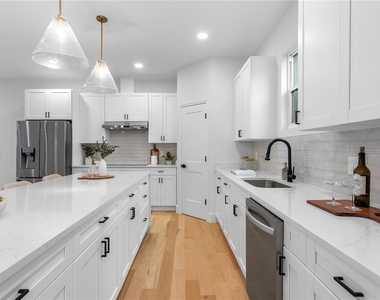 6830 S De Soto Street - Photo Thumbnail 9