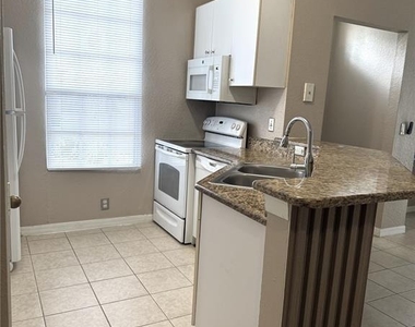 6376 Raleigh Street - Photo Thumbnail 7