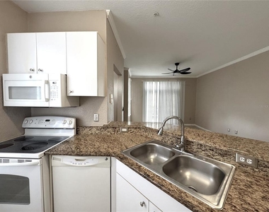 6376 Raleigh Street - Photo Thumbnail 10