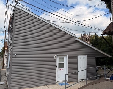 60 E North Street - Photo Thumbnail 3