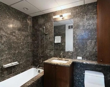 E 59th St. - Photo Thumbnail 8