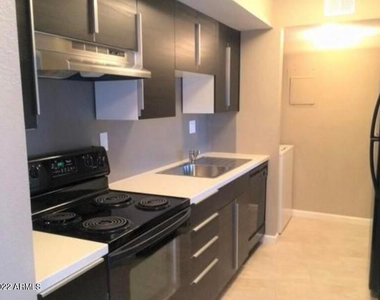 6122 W Morten Avenue - Photo Thumbnail 4