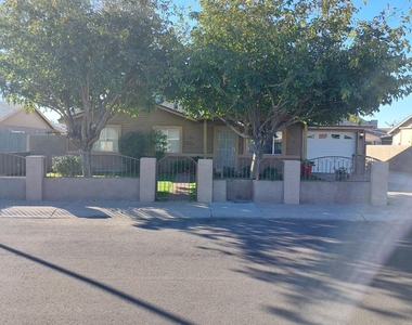 1636 N 64th Drive - Photo Thumbnail 2
