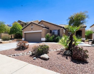 10625 W Salter Drive - Photo Thumbnail 2