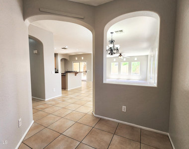10625 W Salter Drive - Photo Thumbnail 3