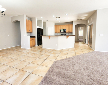 10625 W Salter Drive - Photo Thumbnail 6