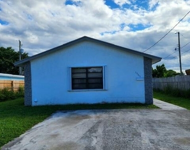 1565 W 36th Street - Photo Thumbnail 3