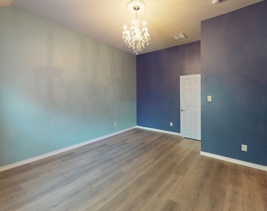 8300 Blue Periwinkle Lane - Photo Thumbnail 17