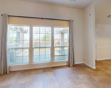8300 Blue Periwinkle Lane - Photo Thumbnail 3