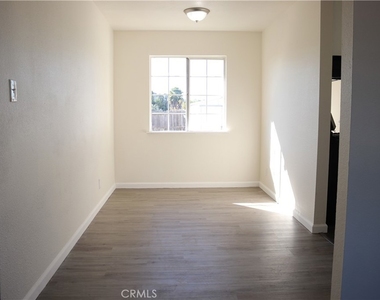 411 N Burton Street - Photo Thumbnail 2