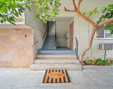 936 N Curson Avenue - Photo Thumbnail 1