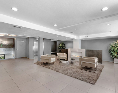 141 S Clark Drive - Photo Thumbnail 4