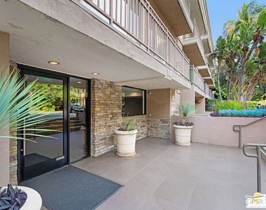141 S Clark Drive - Photo Thumbnail 2