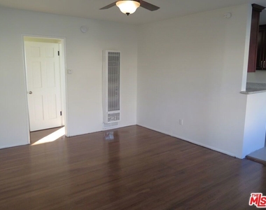 833 N Kingsley Drive - Photo Thumbnail 4