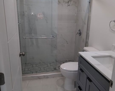 416 E 101st Street - Photo Thumbnail 3