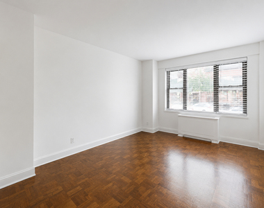 E 56th Street - Photo Thumbnail 3